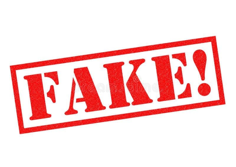 fake rubber stamp red over white background 86701546